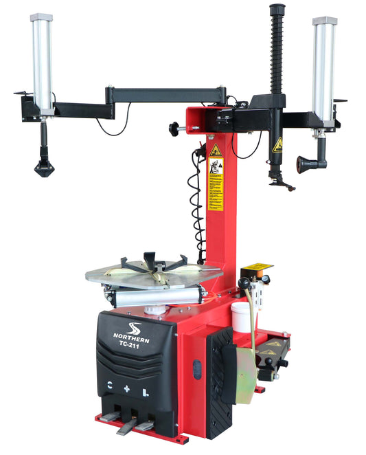 Tire changer with two arms also for low profile tire changer